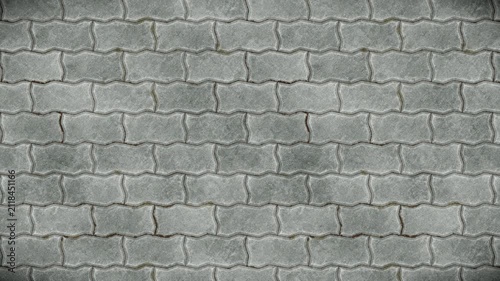 Gray interlocking paving stones form a seamless loop texture background.
