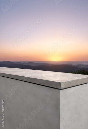 A bench on a concrete ledge overlooking a sunset, Front view of a smooth polished concrete architectural ledge against a soft gradient sunset sky