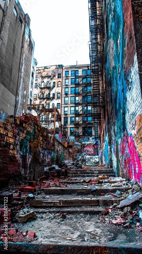 Urban Decay - A Gritty Alleyway Scene with Graffiti and Debris.