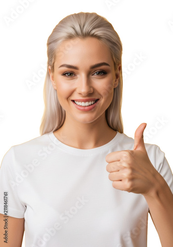 Young caucasian woman with platinum blonde hair and white t-shirt giving a confident thumbs-up, smiling widely against a bright canary yellow studio background. Concept of approval and success