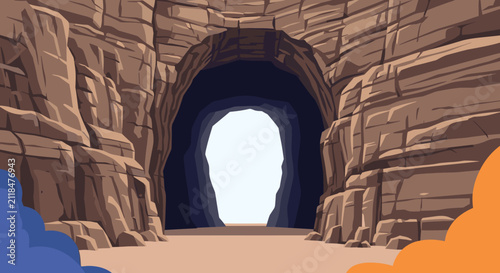 Dramatic rocky canyon landscape featuring a large dark tunnel opening in the steep cliffs under a bright blue sky.