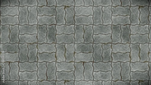 Textured Grey Interlocking Paving Stones Create a Seamless Loop Background Pattern.
