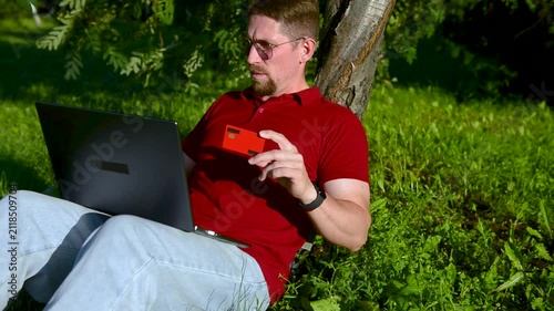 A man makes a card payment on a computer