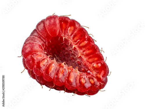 Vibrant red raspberry half, showcasing intricate texture and juicy drupelets.