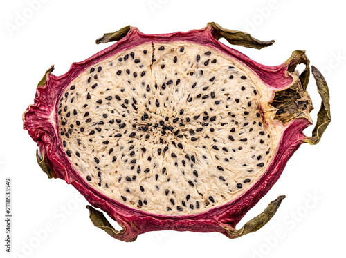 Obraz na plátne Photograph of a precisely cut shriveled and dried dragon fruit in cross-section