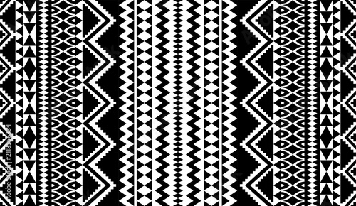 Bold black and white tribal geometric seamless pattern with zigzag, diamond, triangle and striped motifs for textiles, apparel, fabric prints and decorative backgrounds.