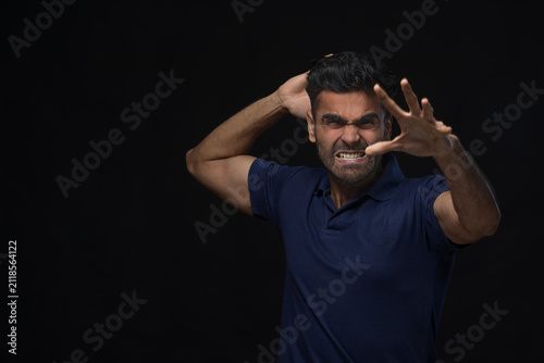 violent young man screaming
