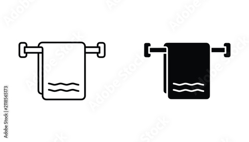 Fotografie Clean soft towel hanging neatly on a sturdy metal bar representing pristine bath