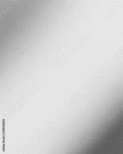 White and grey grainy gradient background with subtle noise texture, smooth monochrome backdrop for website headers, posters, banners and modern digital design.