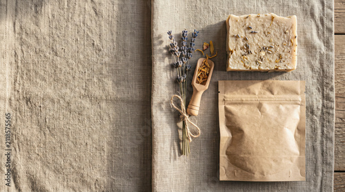 Lavender sprigs rest beside natural soap bar