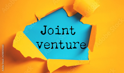 Obraz na płótnie white paper with joint venture text