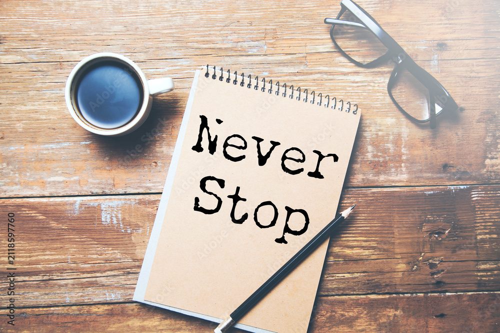 Fototapeta premium Minimalist Motivational Poster with Never Stop
