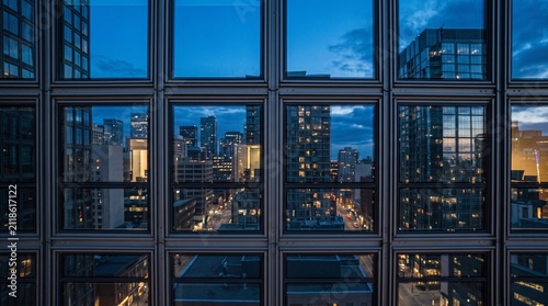 reflection in windows of modern building