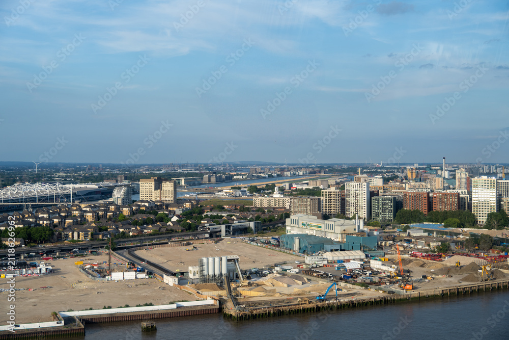 Fototapeta premium Wheybridge, UK - 26 Jun 25: View across Royal Docks from IFS Cloud Cable Car