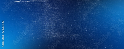 Deep navy blue gradient with vintage film grain and white dust texture overlay high resolution dark atmospheric background for cinematic posters and professional creative designs.