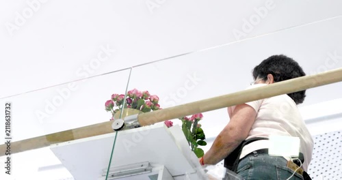 picking fresh roses for a bouquet. Women's Day