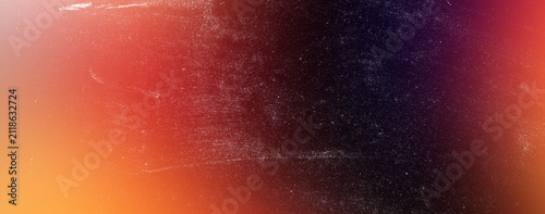 Vibrant orange to dark purple gradient background with subtle light leaks and retro film grain texture overlay providing moody aesthetic for creative digital media and web design work.