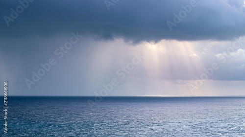 Stormy Ocean with Single Shaft of Sunlight