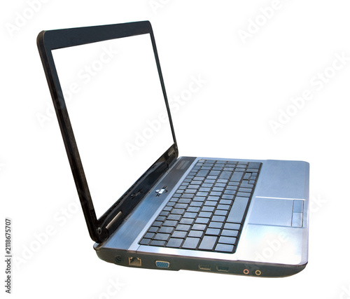Laptop is set on a table with a blank screen and an open design showing its keyboard layout and connections