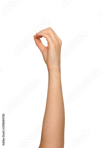 Foto Left hand viewed from the pinky side holding a round shape