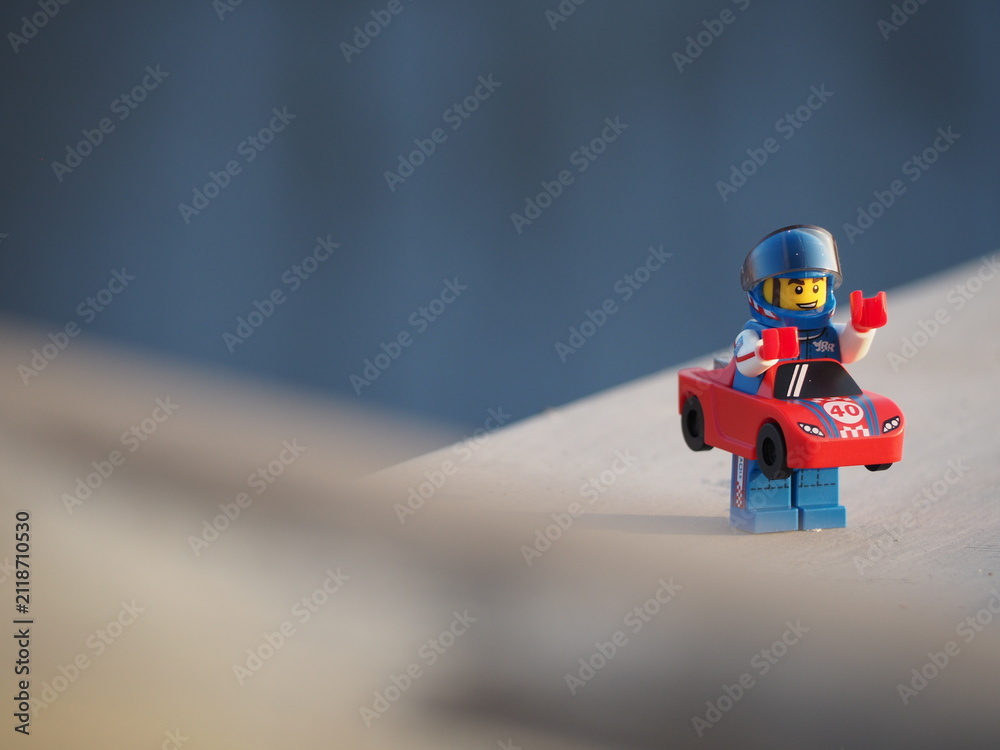 Fototapeta premium Indonesia - July 16, 2019 : Mini toy at outdoor with blurred background. Toy photography design concept.