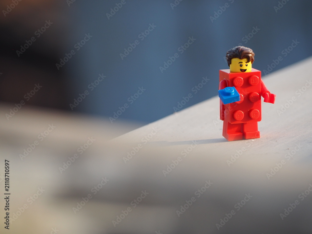 Fototapeta premium Indonesia - April 5, 2024 : Mini toy of action figure at table with blurred background. Toy photography concept. Construction conceptual design.