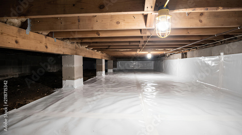 Vapor Barrier Sheeting Installed on Crawl Space Floor Moisture Control