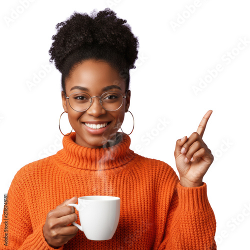 Young african american woman, 20s, warm smile, orange turtleneck, high bun, silver glasses, gold hoops, pointing up, hot mug, soft lavender background, commercial promotion concept