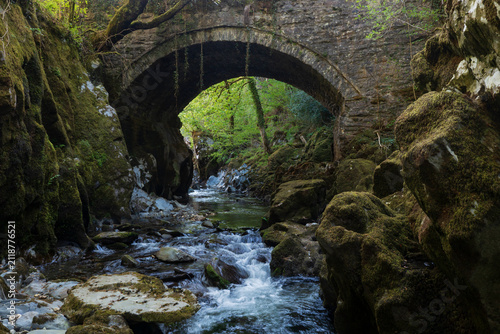 Penmachno Roman Bridge, here is a drystone-built, packhorse bridge over the Machno river called the  'Roman Bridge' but it is actually 16th or 17th century.[