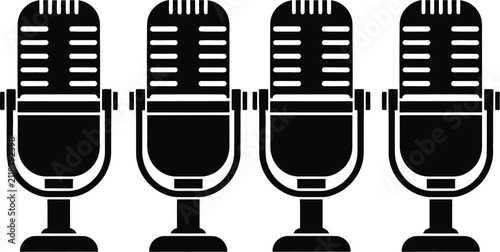 Bild auf Leinwand A set of four vintage style microphones arranged in a row isolated on a clean wh