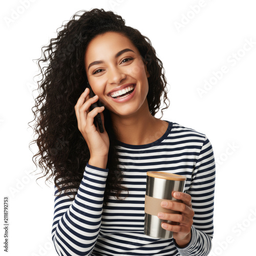 Young mixed-race woman in navy striped shirt, laughing on phone, holding stainless steel coffee mug against transparent cyclorama, high-key studio light, concept of joyful communication