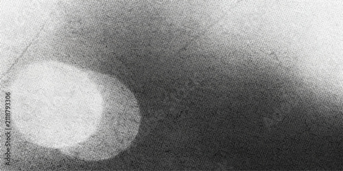 Принти на полотні A blurred, abstract composition of light and shadow, evoking a sense of mystery and introspection with its grainy texture and soft focus