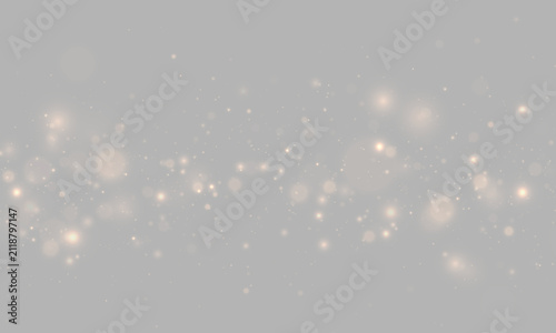 Sparkling gold powder creates a soft luminous cloud. Floating bokeh particles and glittering stars add magical warmth to elegant holiday designs. PNG.