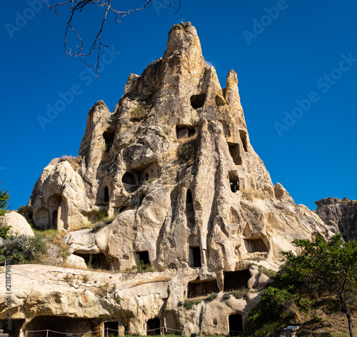 Cappadocia Rock Formations and Cave Houses in Göreme. Beautiful daytime view of the famous fairy chimneys in Cappadocia, Turkey. 