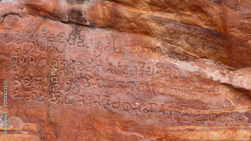 Naklejka premium Ancient old Kannada Scriptures on the Badami Caves, Karnataka, India.