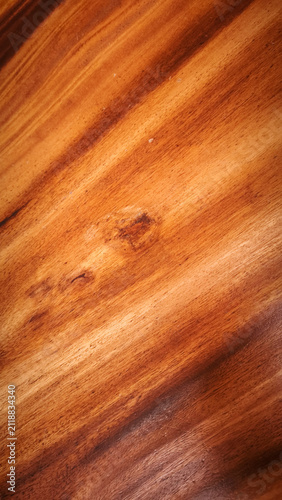 Foto Macro view of a polished wooden surface with natural grain and knot