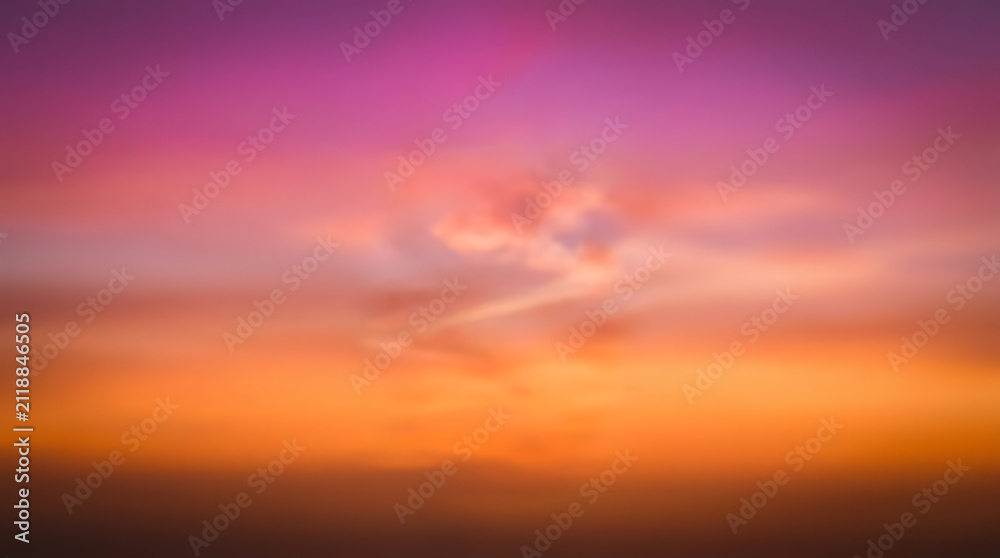 Fototapeta premium Abstract Blurred Background with Gradient Colors of Purple, Pink and Orange Sunset Sky