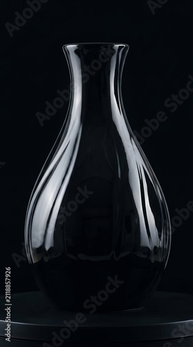 Modern glossy black vase elegant decorative object studio shot reflection luxury home decor minimalist design