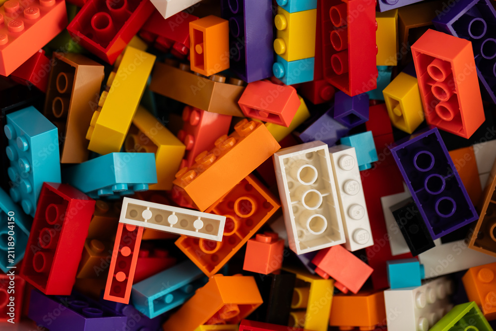 Fototapeta premium Colorful mix of plastic Lego building blocks and bricks background