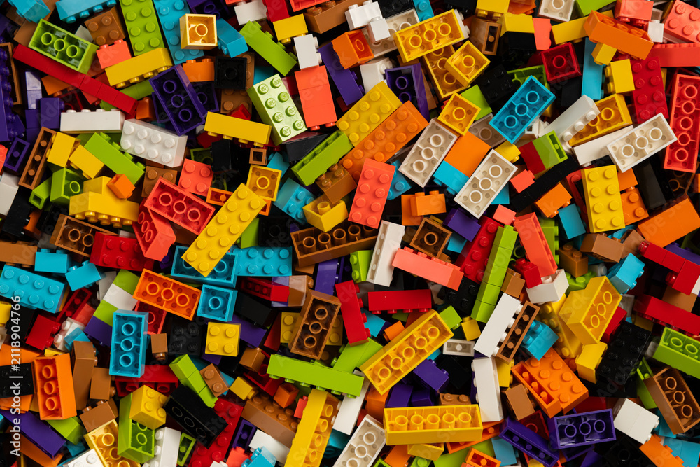 Fototapeta premium Colorful mix of plastic Lego building blocks and bricks background