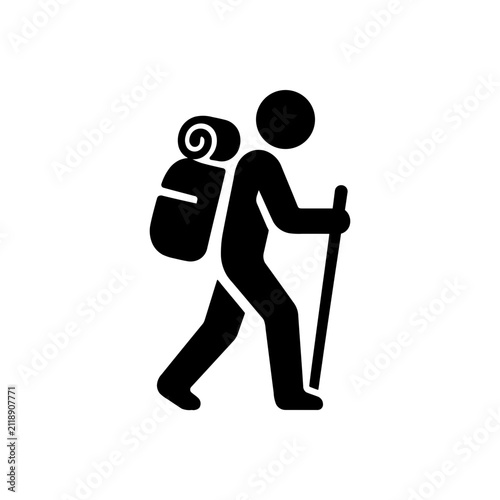 Hiker walking with backpack and walking stick icon