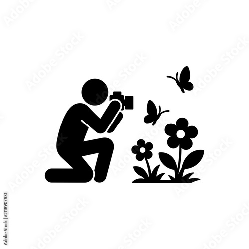 Photographer taking pictures of flowers icon