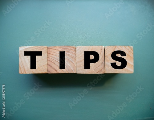 tips written on wooden cubes