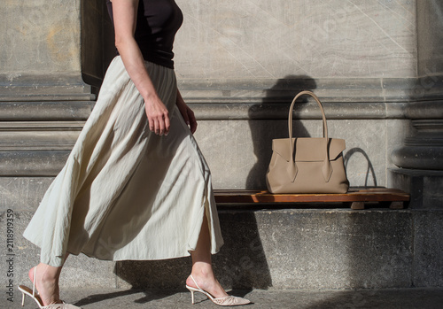 young woman with a handbag