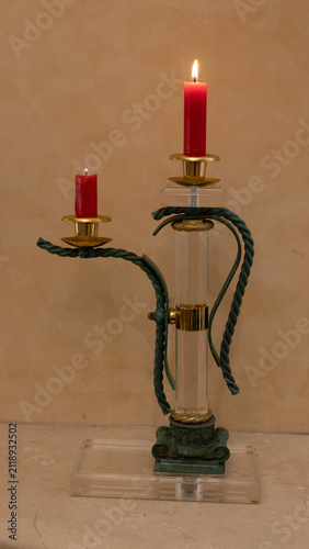 Fotografie candlestick with red candle