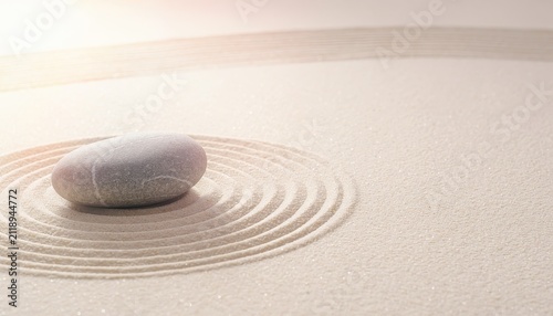 Meditation Sand Pattern Concept. Zen garden stone with concentric sand circles in minimalist setting