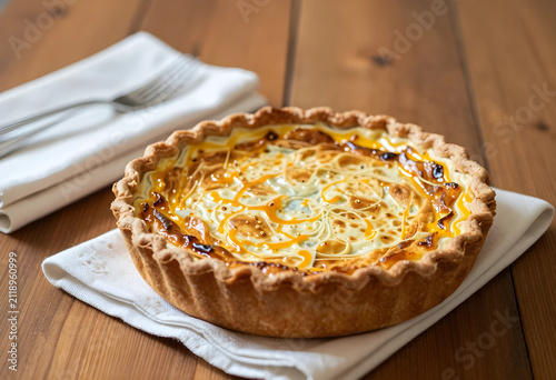 Savory quiche with golden c...