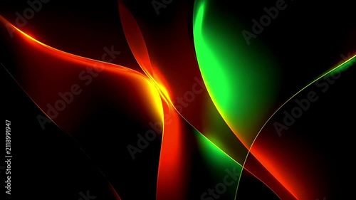 Abstract background with flowing red and green light waves on black.