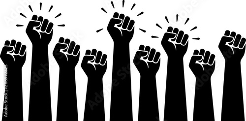 Obraz na płótnie Group of black silhouette clenched fists raised in the air with radiating light lines, symbolizing unity, strength, and empowerment