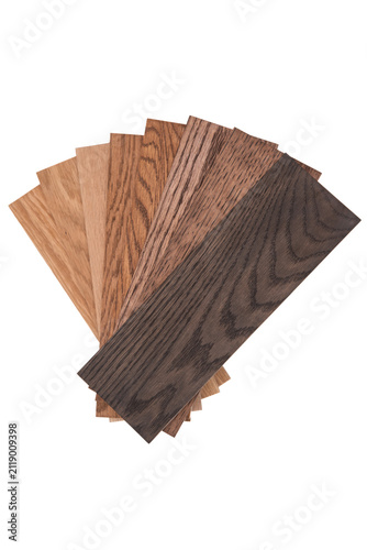 Fan-shaped wood color swatches and veneer samples isolated on white background.